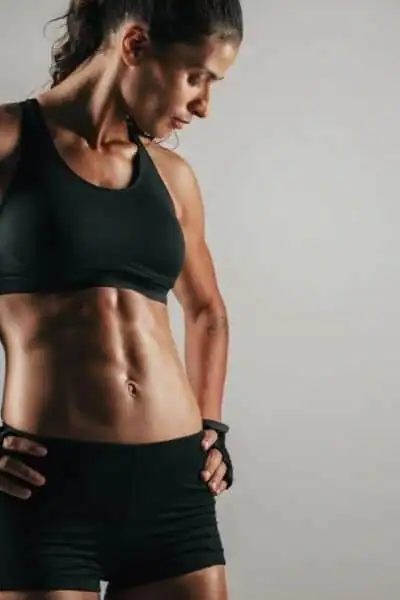 Toning Up at Home: The Ultimate Guide to Bodyweight Exercises 2 Image of woman's toned stomach after bodyweight exercises Eccles and non-surgical treatment from Lipo 360