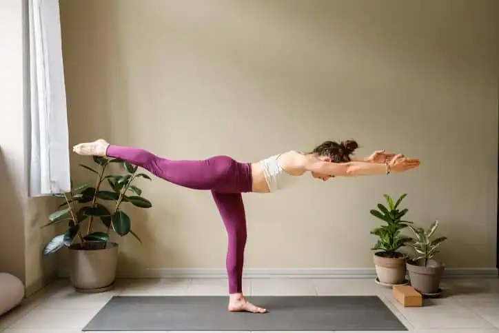 Achieving the Perfect Tone: How Often Should You Exercise for Results? 1 Woman doing Yoga exercise Eccles to help with toning the body.