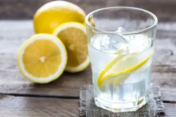 Hydration: The Secret Ingredient for a Toned Stomach and Enhanced Fitness 2 Image of lemon water to aid hydration Eccles