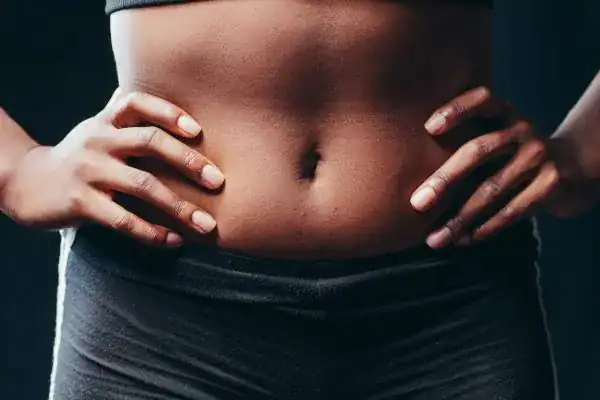 Toning Your Stomach: The Ultimate Guide to Achieving a Sculpted Stomach While Shedding Pounds 1 Image of a toned stomach after non surgical treatment Eccles